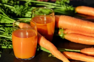 10 increíbles beneficios del jugo de zanahoria 5 beneficios del jugo de zanahoria